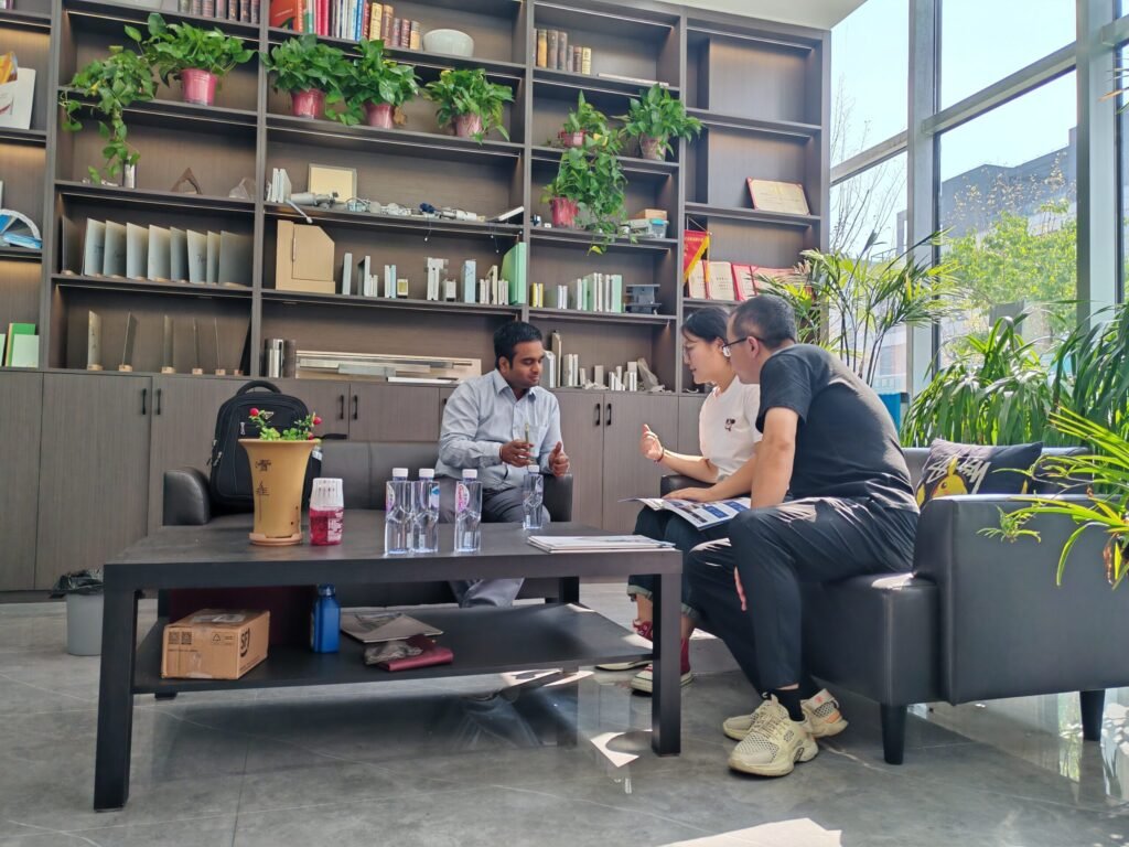 OSIDEK engineering team in a strategic business negotiation with an international client, discussing custom medical radiation protection and cleanroom solutions.